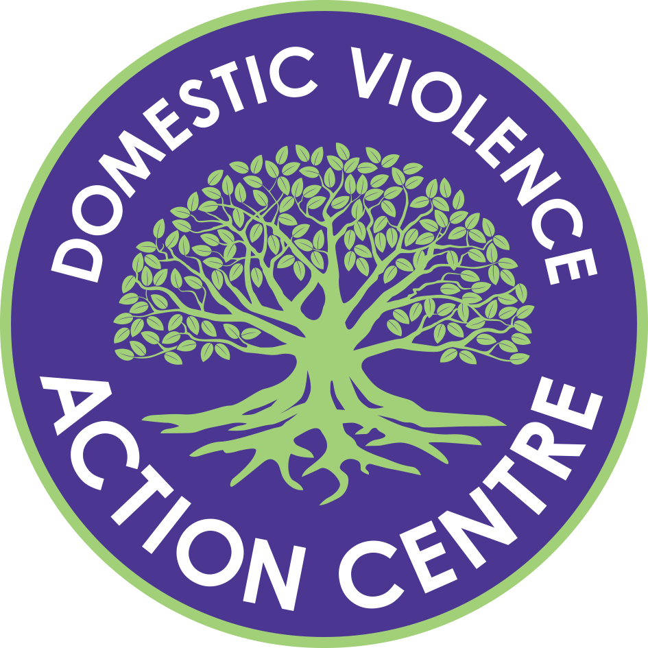 Domestic Violence Action Centre in white words on a purple background around a Moreton Bay Fig tree.